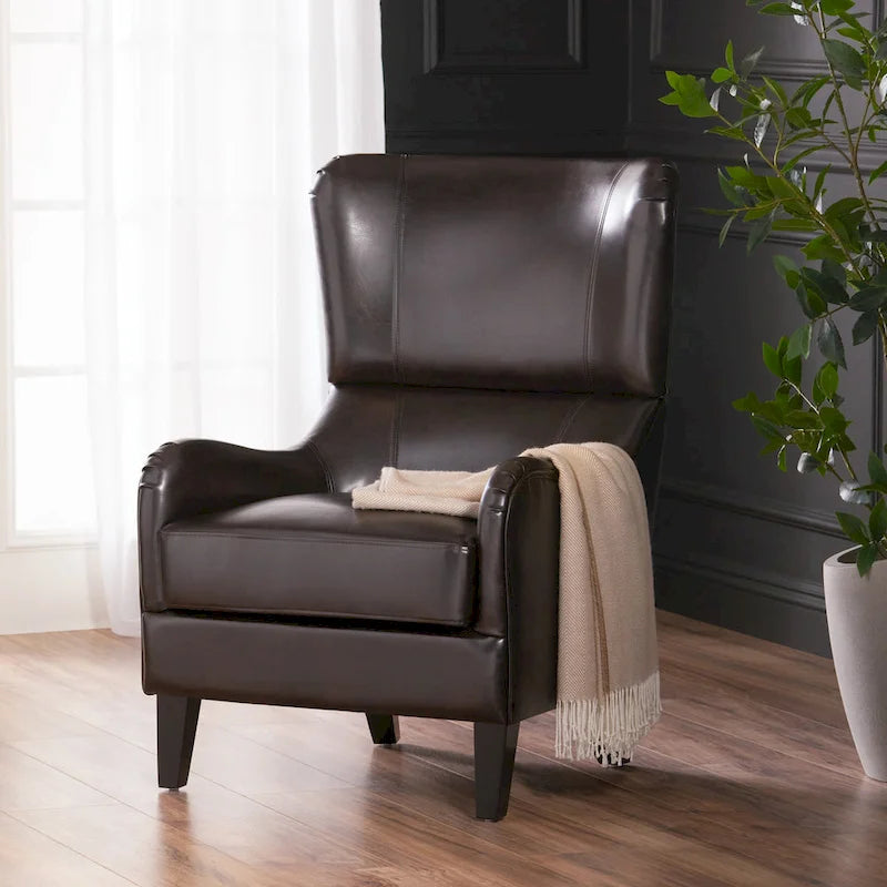 Sillón decorativo de respaldo alto con orejas y patas de madera de abedul