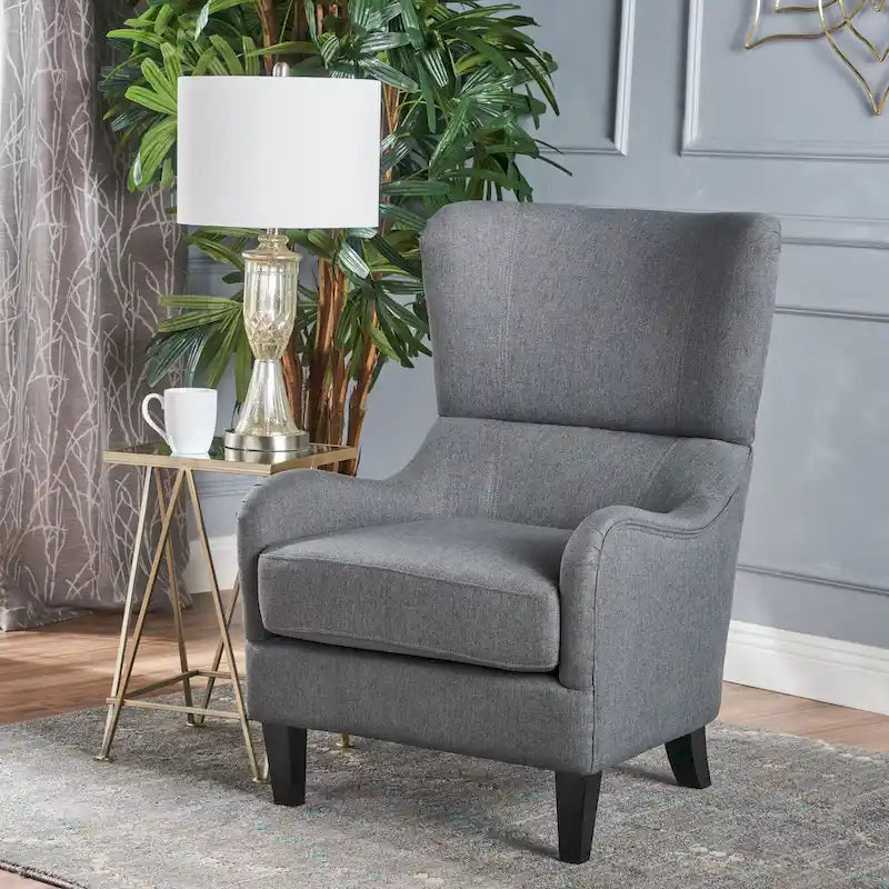 Sillón decorativo de respaldo alto con orejas y patas de madera de abedul