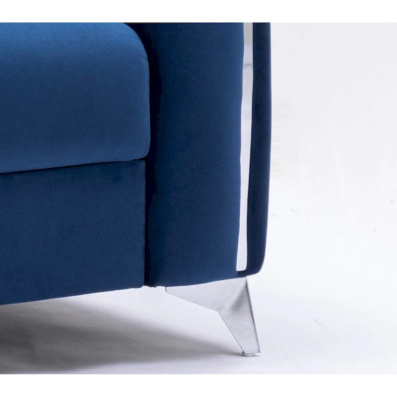 Sillón decorativo de terciopelo azul con ribete cromado y reposabrazos plisados verticales