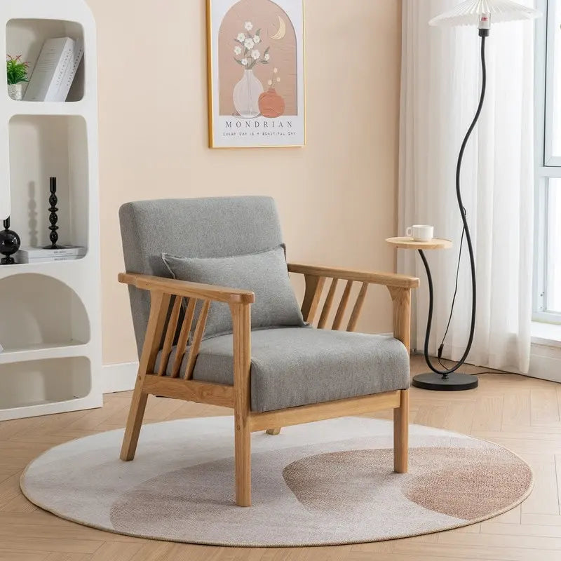 Sillón tapizado auxiliar de mediados de siglo con almohada