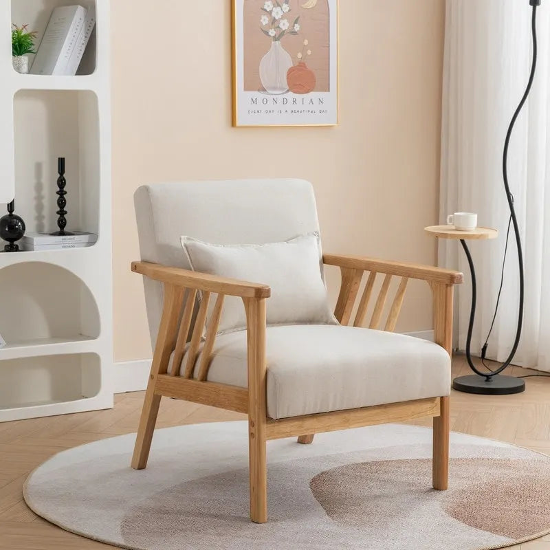 Sillón tapizado auxiliar de mediados de siglo con almohada
